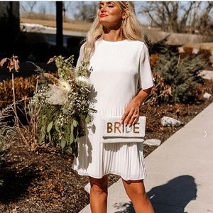 Impressions Boutique white dress.